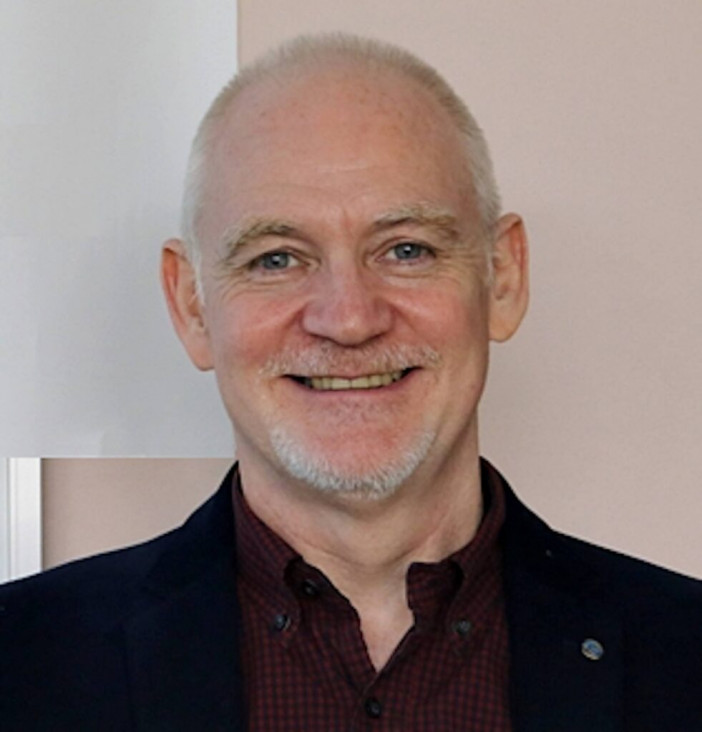 imagen Geoff Lindsey en la FFyL UNCUYO 